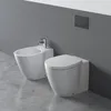 A modern bathroom setting with a bidet and a toilet against a gray wall. Anteprima dell’immagine prodotto