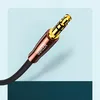 A close-up shot of a UGREEN audio cable connector. Náhled obrázku produktu