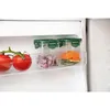 Food storage containers with chopped vegetables and tomatoes inside a refrigerator. Produktbild-Vorschau