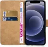 A wallet-style phone case with credit cards and banknotes inserted, next to a smartphone. Produktbild-Vorschau