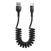 A black coiled USB-C charging cable with a USB-A connector on one end and a USB-C connector on the other, displayed against a white background. Anteprima dell’immagine prodotto