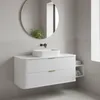 A modern white bathroom vanity with a sink and mirror. Náhled obrázku produktu