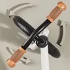 A close-up shot of a child's balance bike handlebars and wheel, with graphic arrows indicating movement. Náhled obrázku produktu