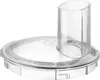 A clear studio shot of a clear plastic food processor lid with a feeding chute. Podgląd zdjęcia produktu