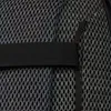 A close-up view of the mesh fabric and a black strap on a backpack. Produktbild-Vorschau