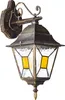 A classic outdoor wall lamp with a black and gold finish and stained glass panels. Anteprima dell’immagine prodotto