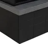 A close-up view of the corner of a black outdoor fireplace with a gray concrete top. Náhled obrázku produktu