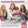 Four young people are looking at a board game box. Anteprima dell’immagine prodotto