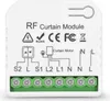 A white electronic module with green screw terminals, showing wiring diagrams and labels. Produktbild-Vorschau