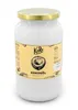A jar of coconut oil with a label. Produktbild-Vorschau