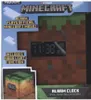 The image shows the packaging of a Minecraft alarm clock, designed to look like a Minecraft block. Náhľad obrázku produktu