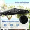 A black umbrella is shown outdoors, with text overlays highlighting its features. Náhled obrázku produktu