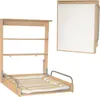 A wall-mounted folding changing table with shelves and a changing mat. Produktbild-Vorschau
