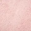 A close-up, top-down view of a pink shaggy rug. Produktbild-Vorschau