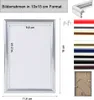 A silver picture frame with dimensions and color options shown. Produktbild-Vorschau
