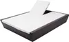 A brown rattan outdoor lounge bed with white cushions is shown against a white background. Náhľad obrázku produktu