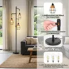 A floor lamp with three industrial-style metal shades is shown in a living room setting, next to a sofa and on a rug. The image also includes close-up shots highlighting product features and text descriptions. Produktbild-Vorschau