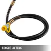 A close-up view of a hydraulic hose with a yellow connector and a black coiled hose. Náhled obrázku produktu