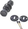 A set of black door knobs and related hardware on a white background. Anteprima dell’immagine prodotto