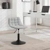 A gray chenille stool with a black base is shown in a well-lit room with a white desk and shelves. Produktbild-Vorschau