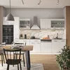 A modern, white high-gloss kitchen with a marble backsplash, a dining table with chairs in the foreground, and a plant in the background. Náhled obrázku produktu