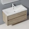 A modern wall-mounted bathroom vanity with a white integrated sink and a light wood-effect cabinet with two drawers. Anteprima dell’immagine prodotto