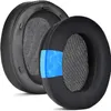Two black ear pads for headphones, one showing a cutaway view of its internal layers. Produktbild-Vorschau