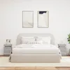 A bedroom scene with a bed and two nightstands. Podgląd zdjęcia produktu