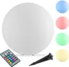 A large white sphere light with a remote control and a ground stake, shown with smaller spheres of different colors in the background. Náhled obrázku produktu