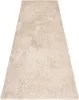A beige rug laid out on a white background. Náhľad obrázku produktu