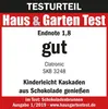 A product review badge from Haus & Garten Test showing the rating and details of a chocolate fountain. Podgląd zdjęcia produktu