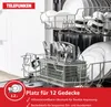 Inside of a dishwasher showing racks filled with dishes and cutlery. Produktbild-Vorschau