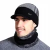 A man wearing a winter hat and scarf. Produktbild-Vorschau
