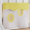 A close-up view of a white bed frame with a yellow and white patterned curtain attached. Produktbild-Vorschau