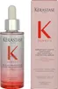 A product shot of a Kérastase Genesis serum bottle and its packaging. Produktbild-Vorschau
