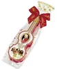Verpackungsbild Reber Mozart Geige mit Mozartkugeln gefüllt 140g Voir les images du produit