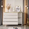 A modern white dresser with gold accents, decorated with a bust, a painting, and dried flowers. Produktbild-Vorschau