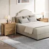 A bedroom scene with a bed, nightstands, and a rug. Produktbild-Vorschau