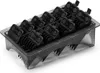 A set of black clipper guards in a clear plastic organizer tray. Produktbild-Vorschau