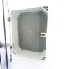 An open electrical enclosure with a perforated panel inside, mounted on a white background. Produktbild-Vorschau