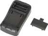 The back of a black digital multimeter with the battery compartment open and the battery cover removed, shown on a white background. Produktbild-Vorschau