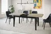 A dining room setting with an extendable table and chairs. Produktbild-Vorschau