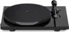 A black turntable is shown from a slightly elevated front-facing angle against a white background. Produktbild-Vorschau