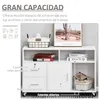 A white filing cabinet with drawers and shelves, decorated with a framed picture and a basket. Produktbild-Vorschau
