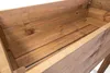 Close-up view of the interior of a wooden raised garden bed. Produktbild-Vorschau