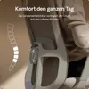 Close-up of an ergonomic office chair, highlighting its lumbar support feature with a graphic illustration of a spine. Podgląd zdjęcia produktu