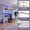 A loft bed with a desk and storage, set up in a bedroom. Voir les images du produit