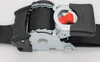 Close-up of a black and silver seatbelt mechanism with a red release button. Anteprima dell’immagine prodotto