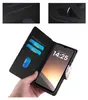 A hand holding a phone case with cards inserted. Produktbild-Vorschau