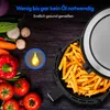 An air fryer filled with french fries is shown next to fresh vegetables and a graphic indicating low oil usage. Produktbild-Vorschau